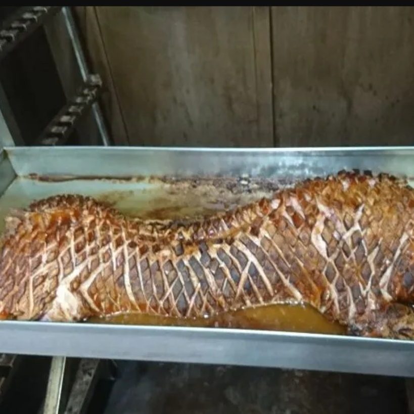 Ganzes Spanferkel mit knuspriger Kruste im Ofen, Partyservice Fleischerei Kolditz Essen
