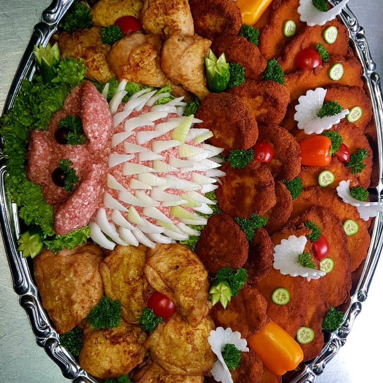 Partyplatte Partyservice Kolditz Essen seit 1934 Reich garnierte Partyplatte mit Aufschnitt, Käse und Fleisch vom Partyservice Kolditz Essen
